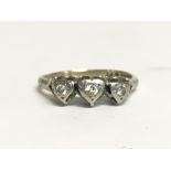 An 18ct gold ring set with chip diamonds. Total we