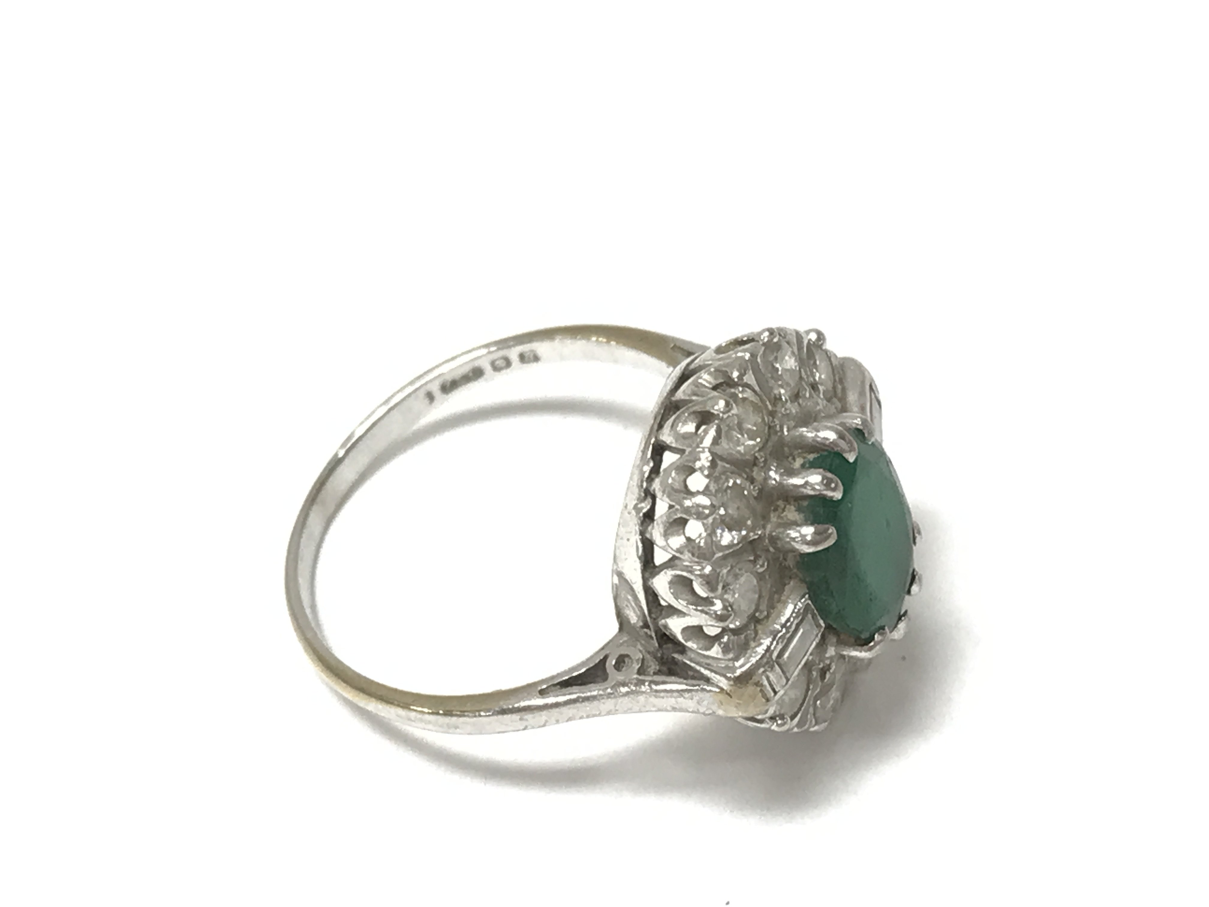 An 18ct white gold emerald and diamond ring. 5.30g - Image 2 of 2