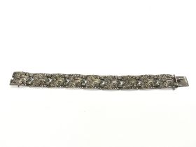 A silver and marcasite bracelet. 18cm long.