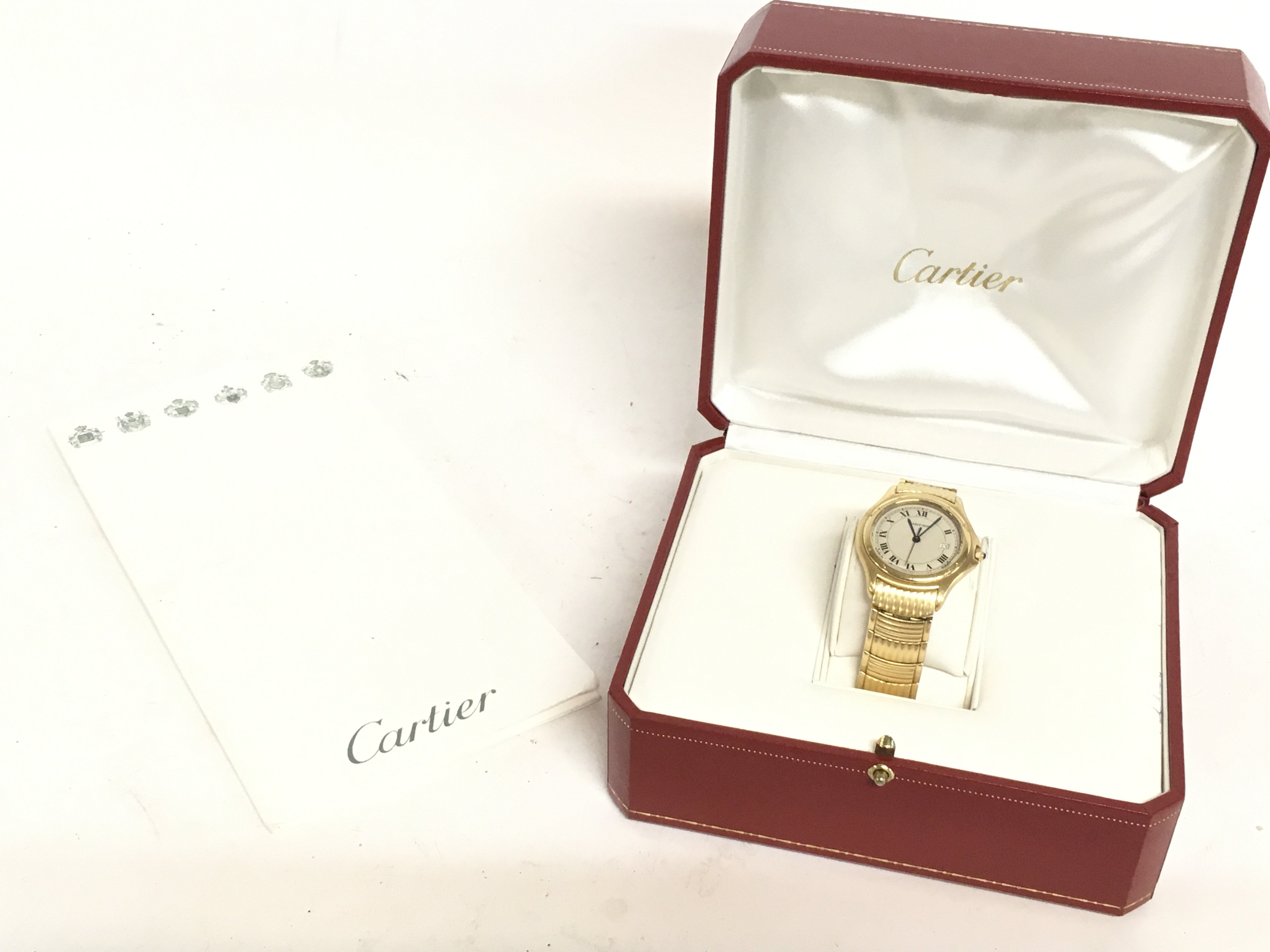 A cased Cartier Cougar yellow metal 18ct watch, Se