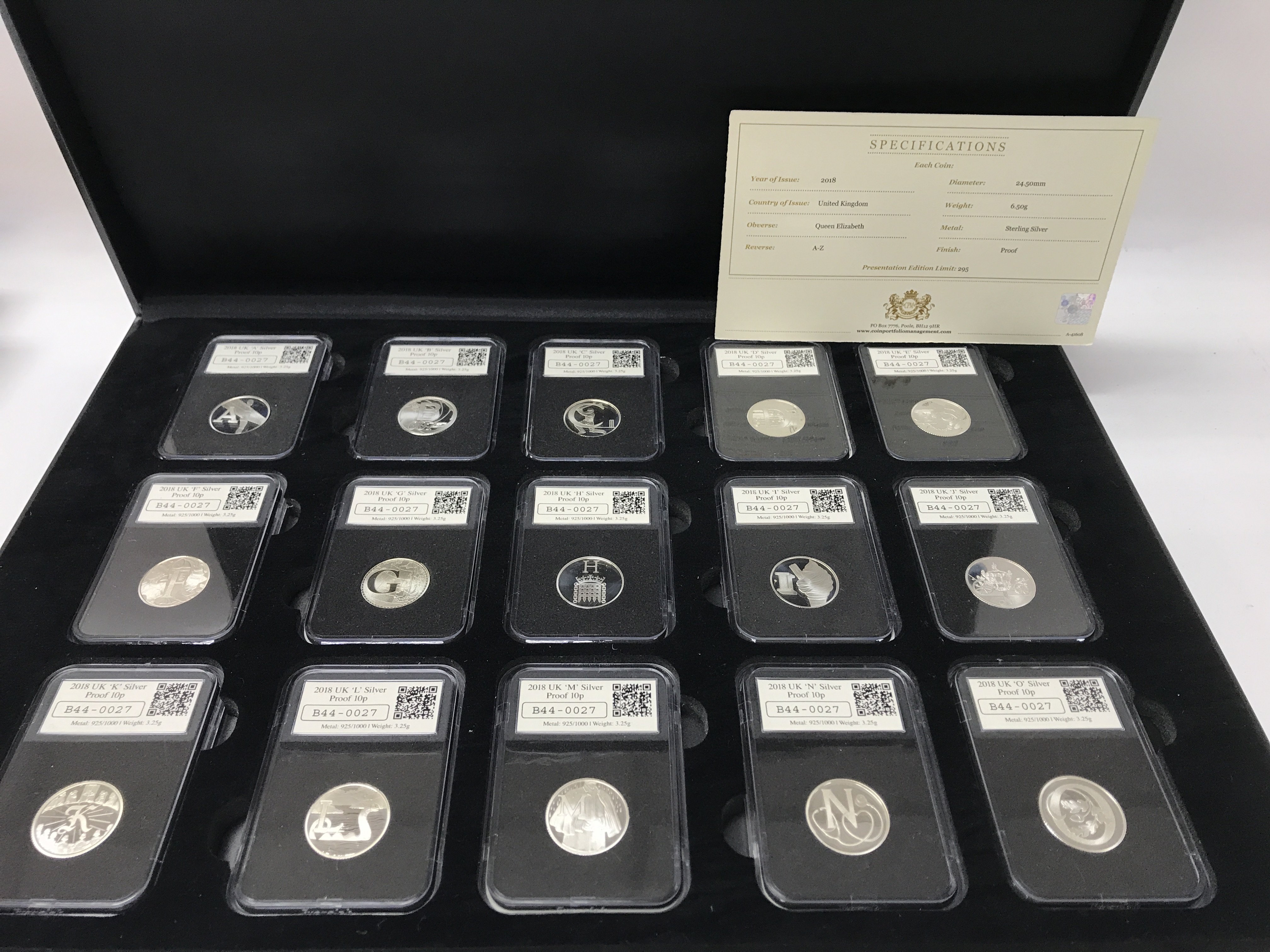 A silver coin set of 26 silver proof slapped coins
