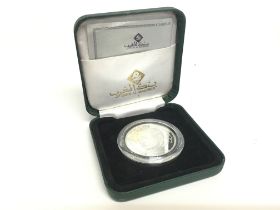 A cased Moroccan silver 250 Dirham coin. Postage c