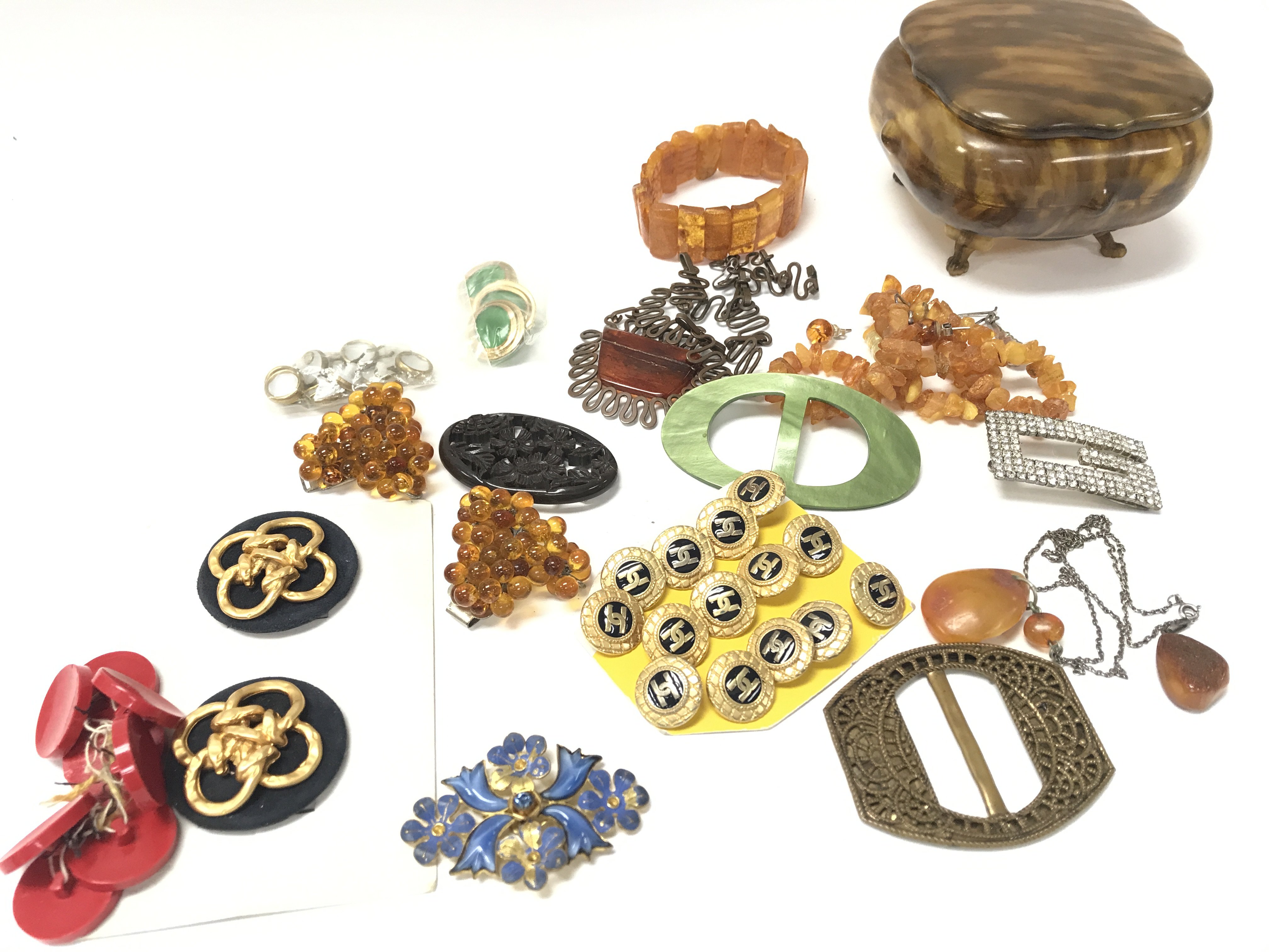 A Collection of vintage buckles and buttons along