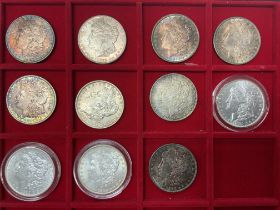 11 Morgan silver dollars. To include 1886, 1878(S)