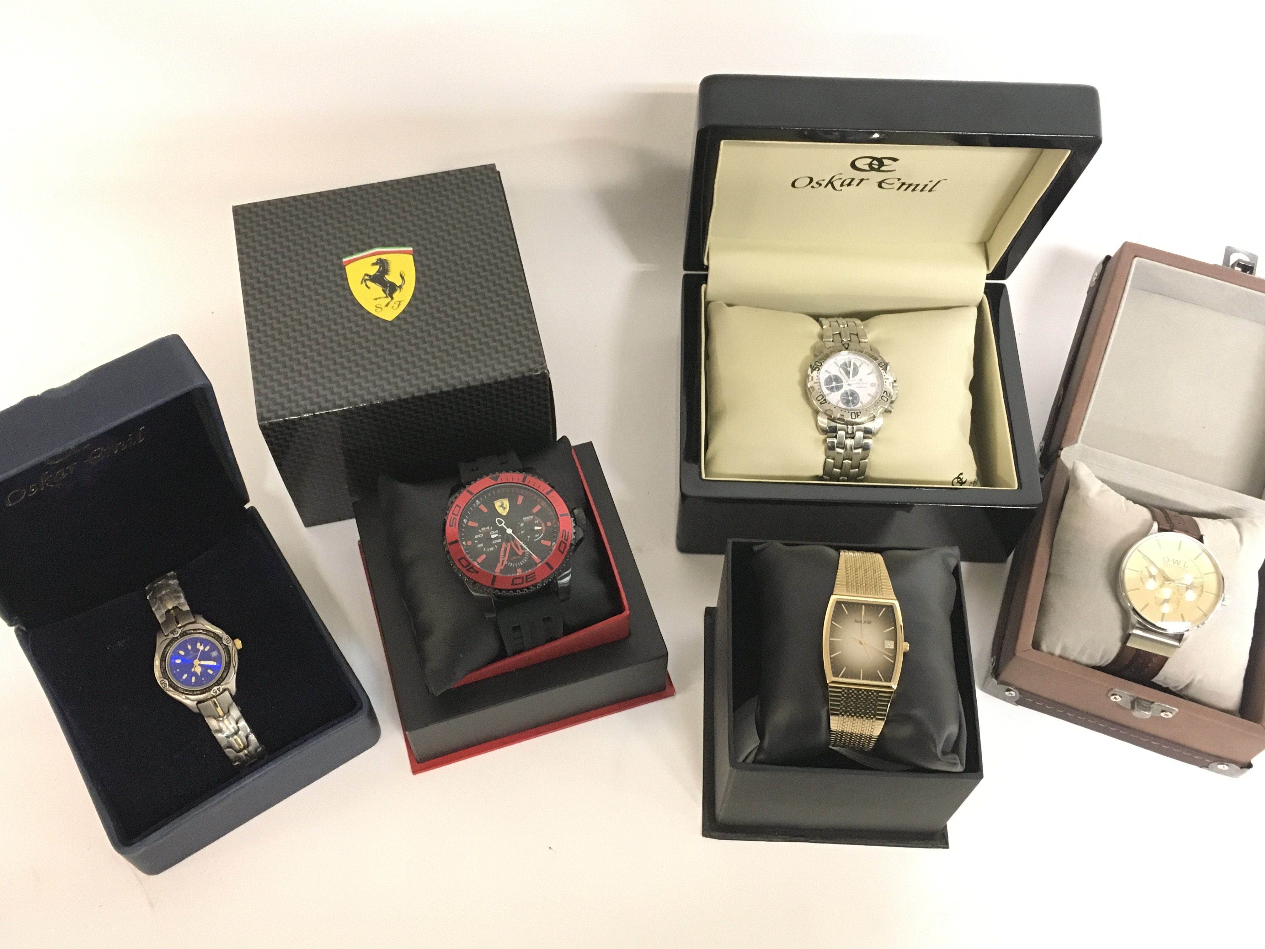 A collection of boxed watches including Oskar Emil