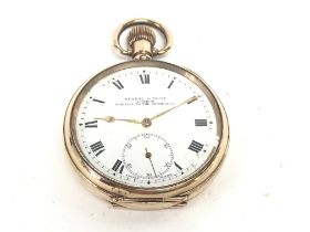 A Kendal and Dent gold plated pocket watch. Winds
