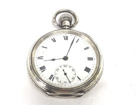 A silver pocket watch. Winds and runs. 50mm case.