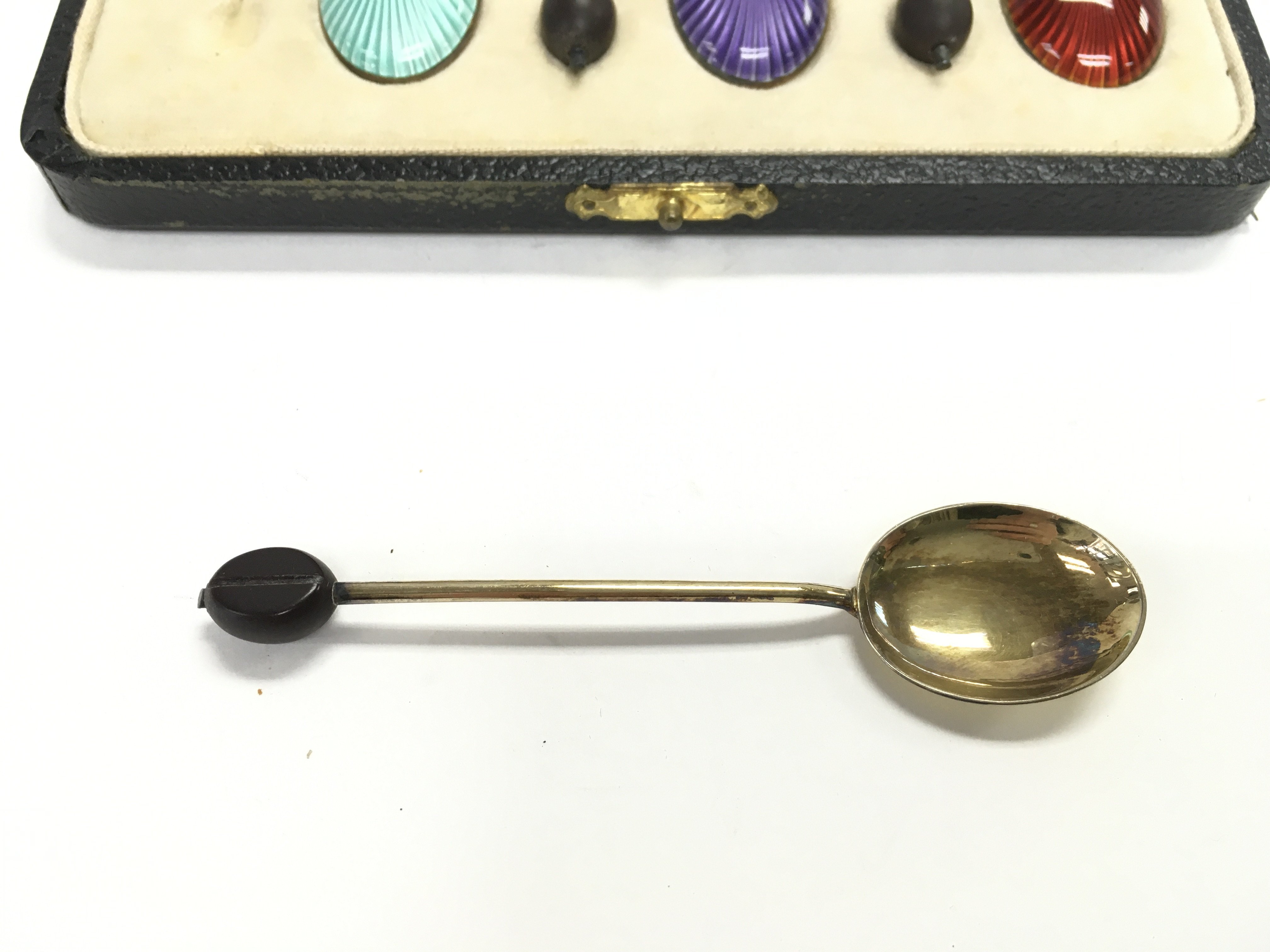 A boxed set of six enamelled spoons. Postage B - Image 3 of 3