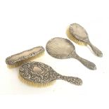 Silver Hallmarked brushes and a mirror. This lot c