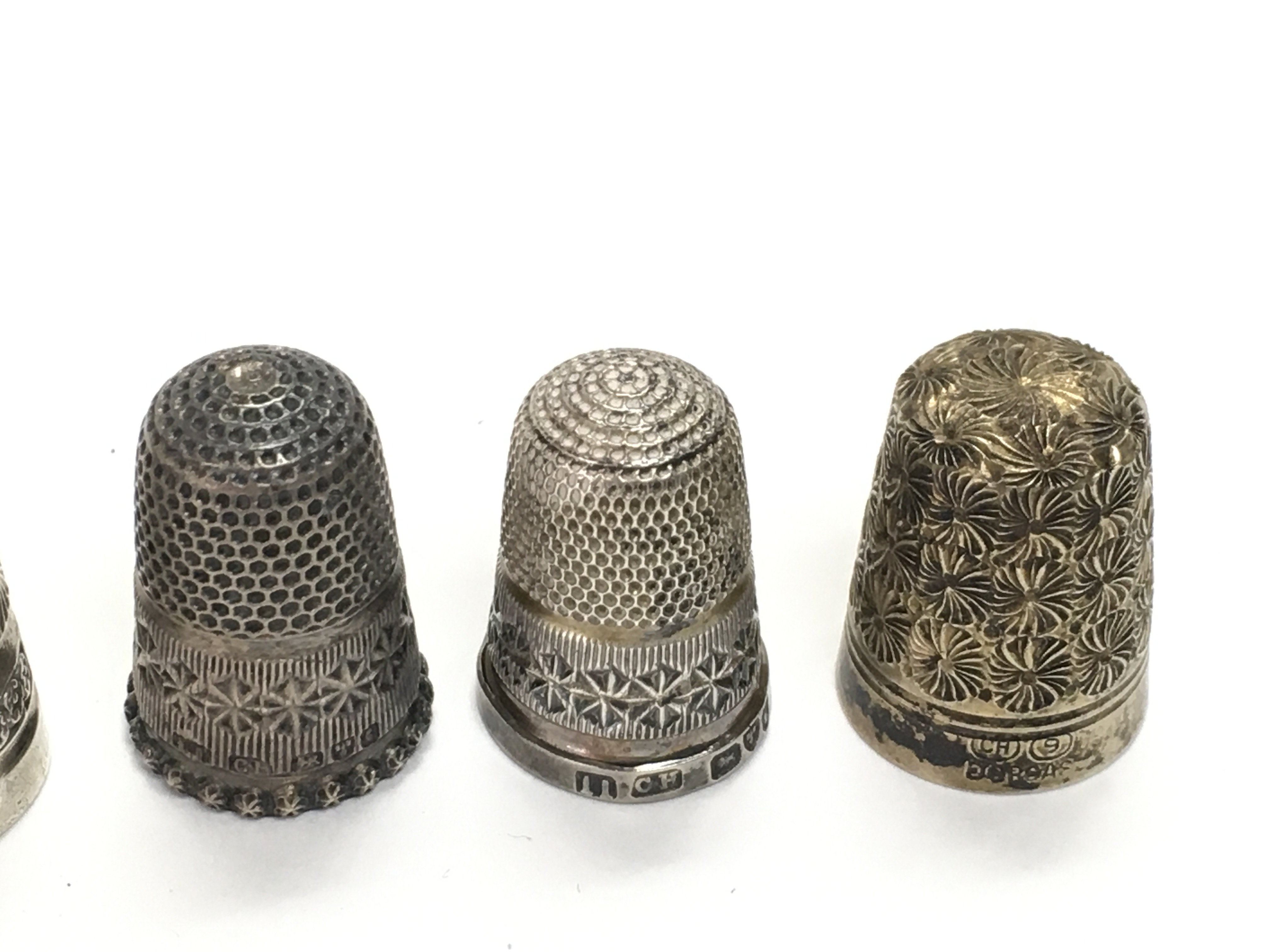 A collection of 12 Charles Horner silver thimbles. - Image 4 of 4