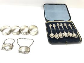 A collection of silver items including case silver