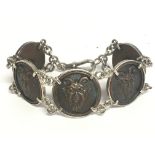 A vintage silver and bronze Satyr bracelet. Postag
