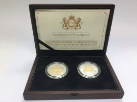 A cased set of two limited edition silver Ã‚Â£5 Pi
