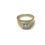 A 9ct gold diamond set gents signet ring. Approx 0