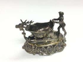 A small Continental silver figural table salt, app