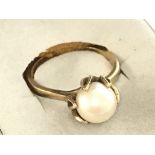 A Pearl 9ct gold ring, size M. 3.1g Postage catego