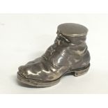 A novelty vintage silver hobnail boot. Postage cat