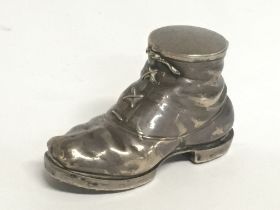A novelty vintage silver hobnail boot. Postage cat