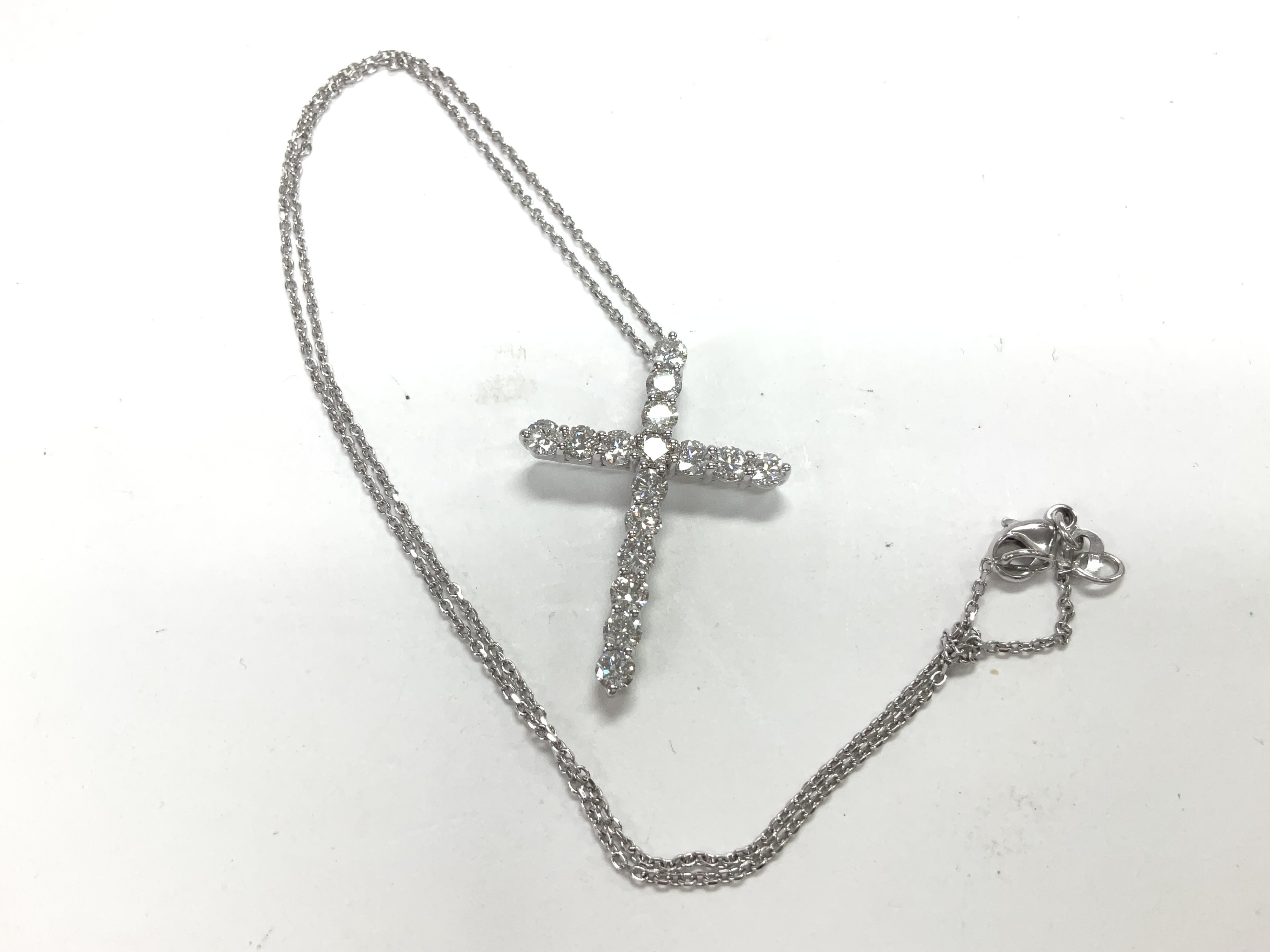 Certificated 18ct white gold cross set with RBC di