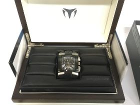A boxed Technomarine Hummer watch. Postage cat B