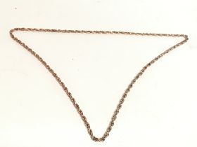 A vintage gold metal chain. Postage category A