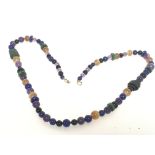 A vintage lapis, amethyst and agate bead necklace.