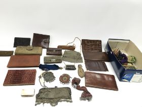A quantity of vintage purses and wallets including