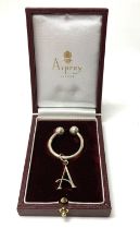 An Aspreys cased initial A sterling silver keyring