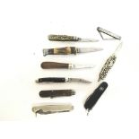 A collection of vintage pocket knives including a