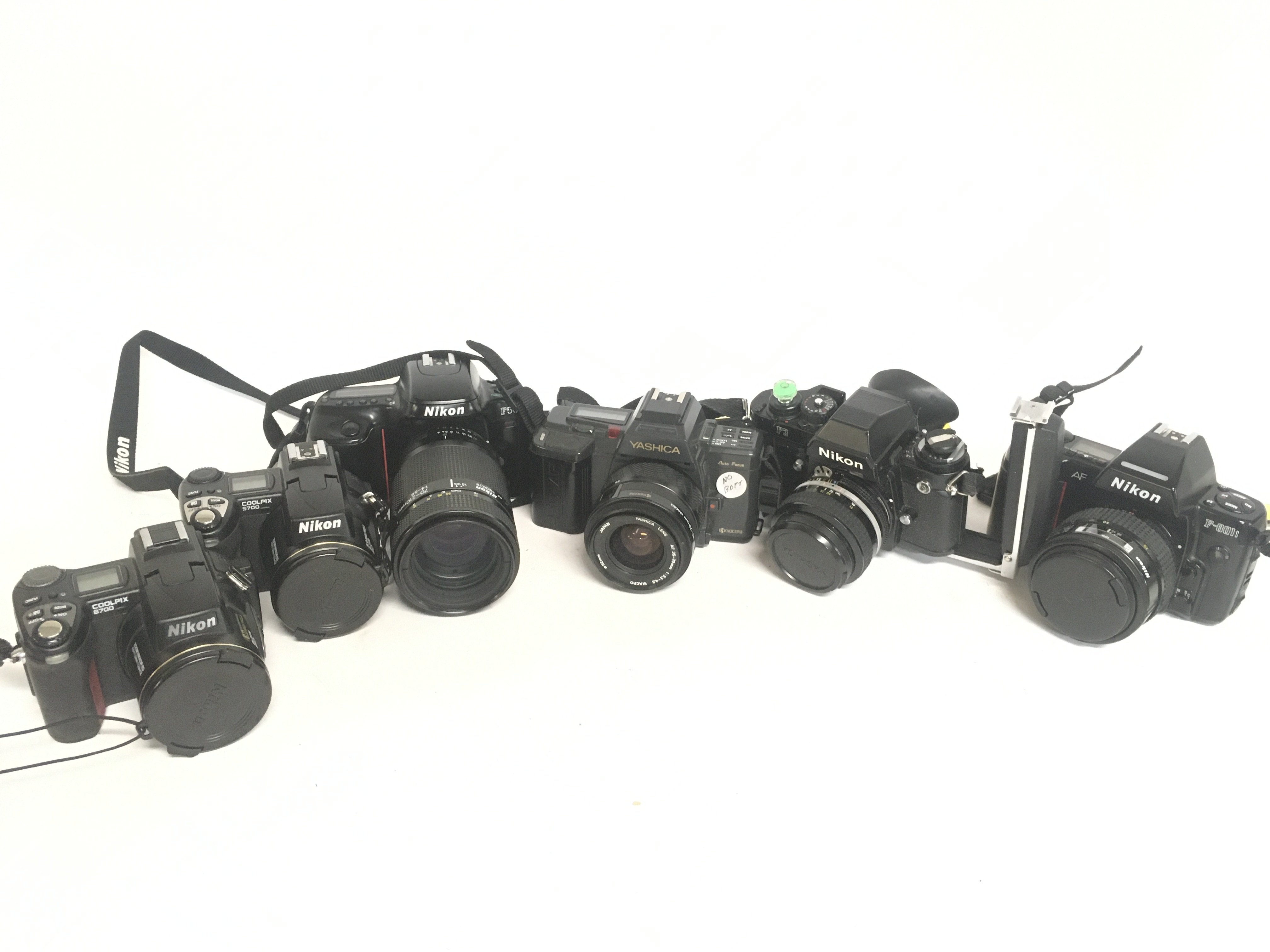 Vintage cameras including Nikon Coolpix 8700, 5700