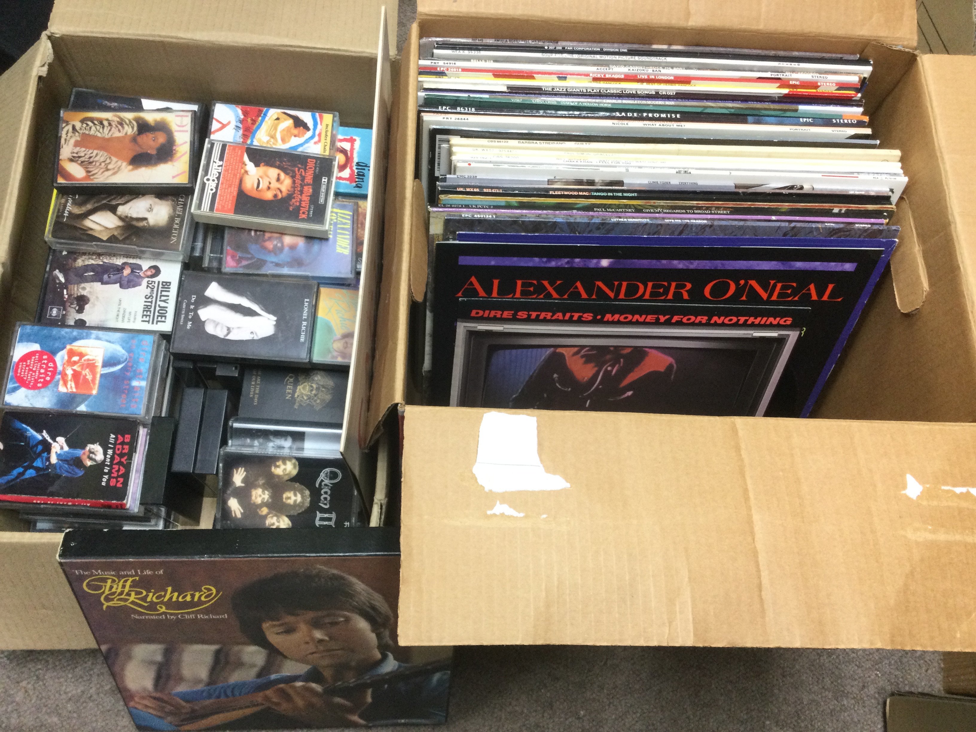 Two boxes of LPs and cassettes by various artists