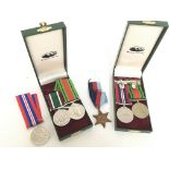 A collection of medals including a 1939-45 star, T