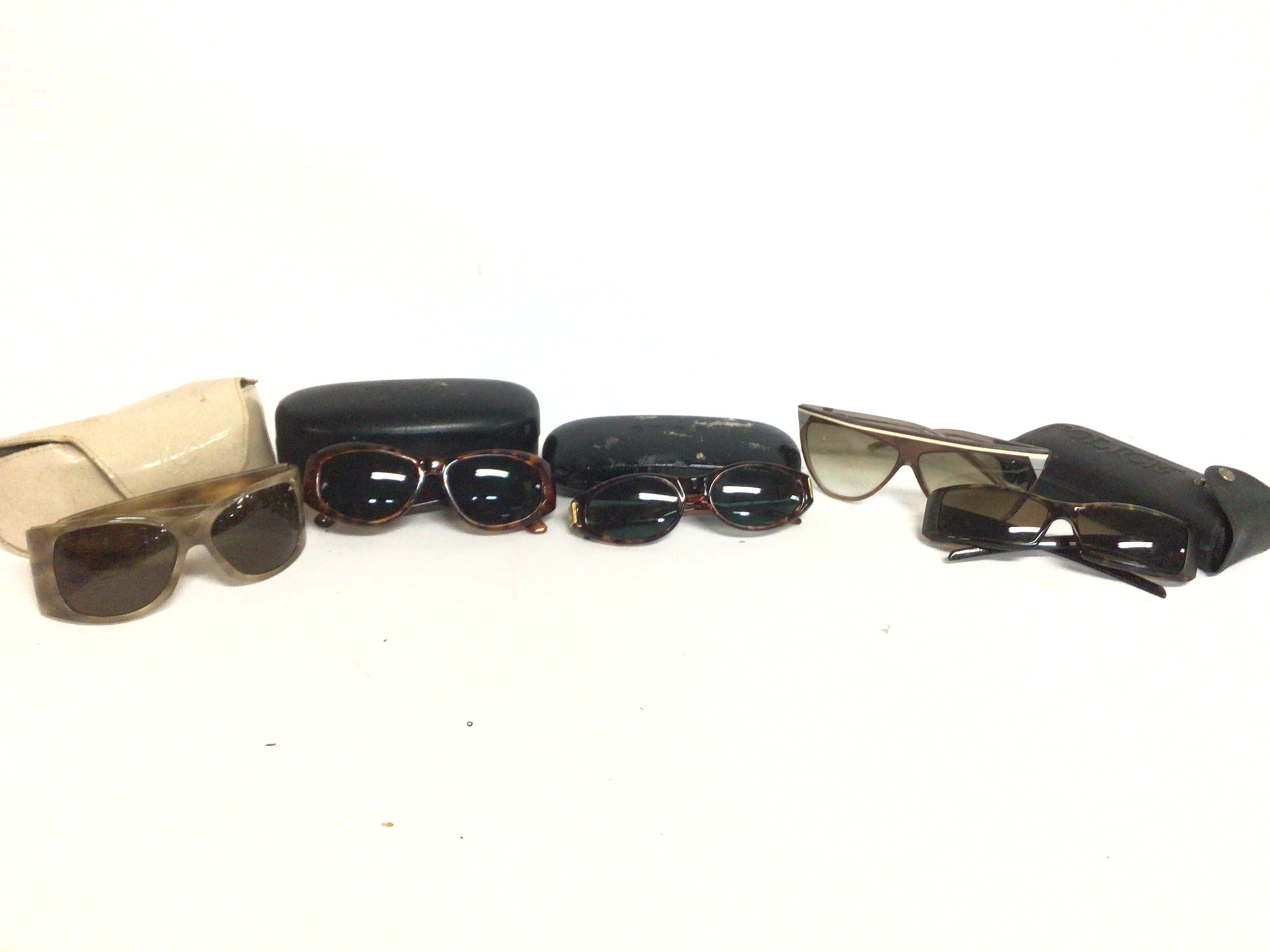 A collection of designer style sunglasses. Postage