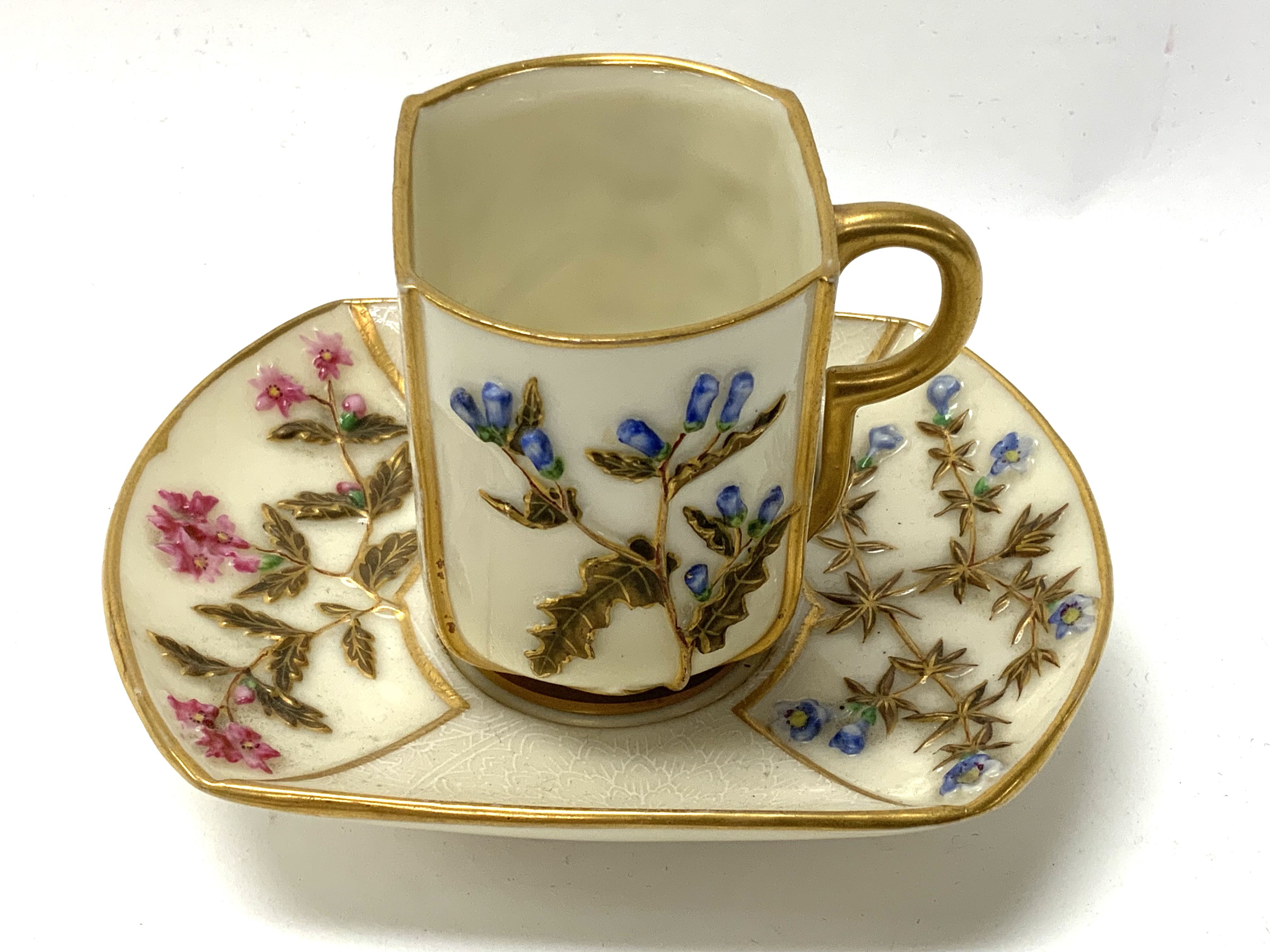 A Royal Worcester Japanese style cabinet cup and s