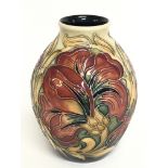 A Moorcroft Spanish vase. 14cm tall. No obvious da