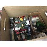 A collection of playworn cars and toys and a boxed