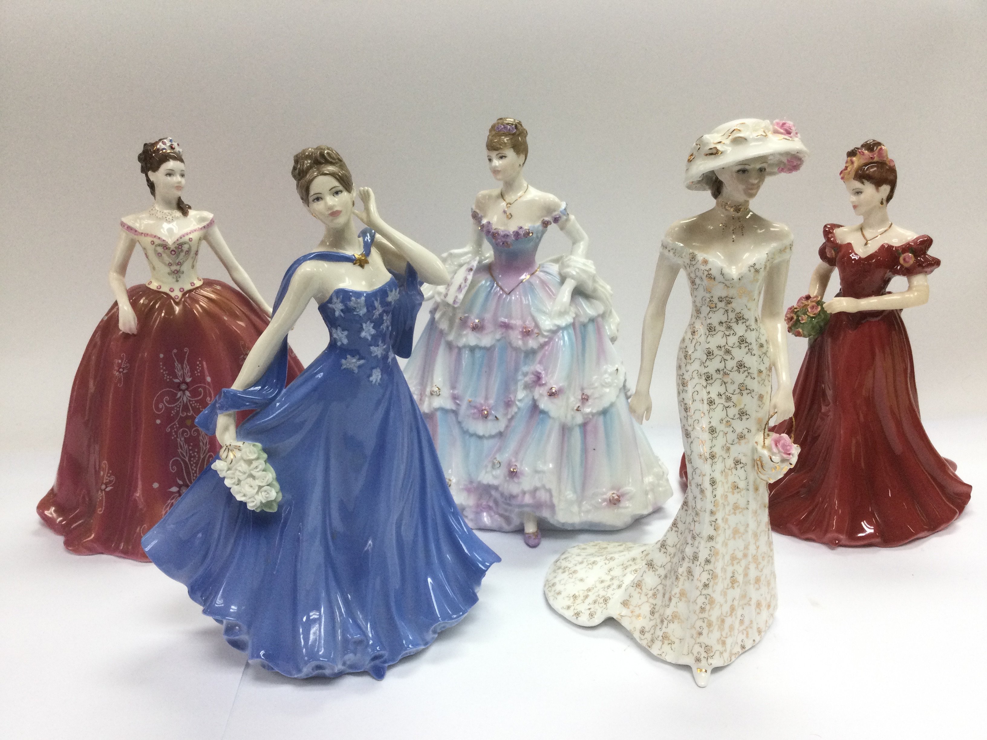 Five figures of ladies comprising Coalport and Roy