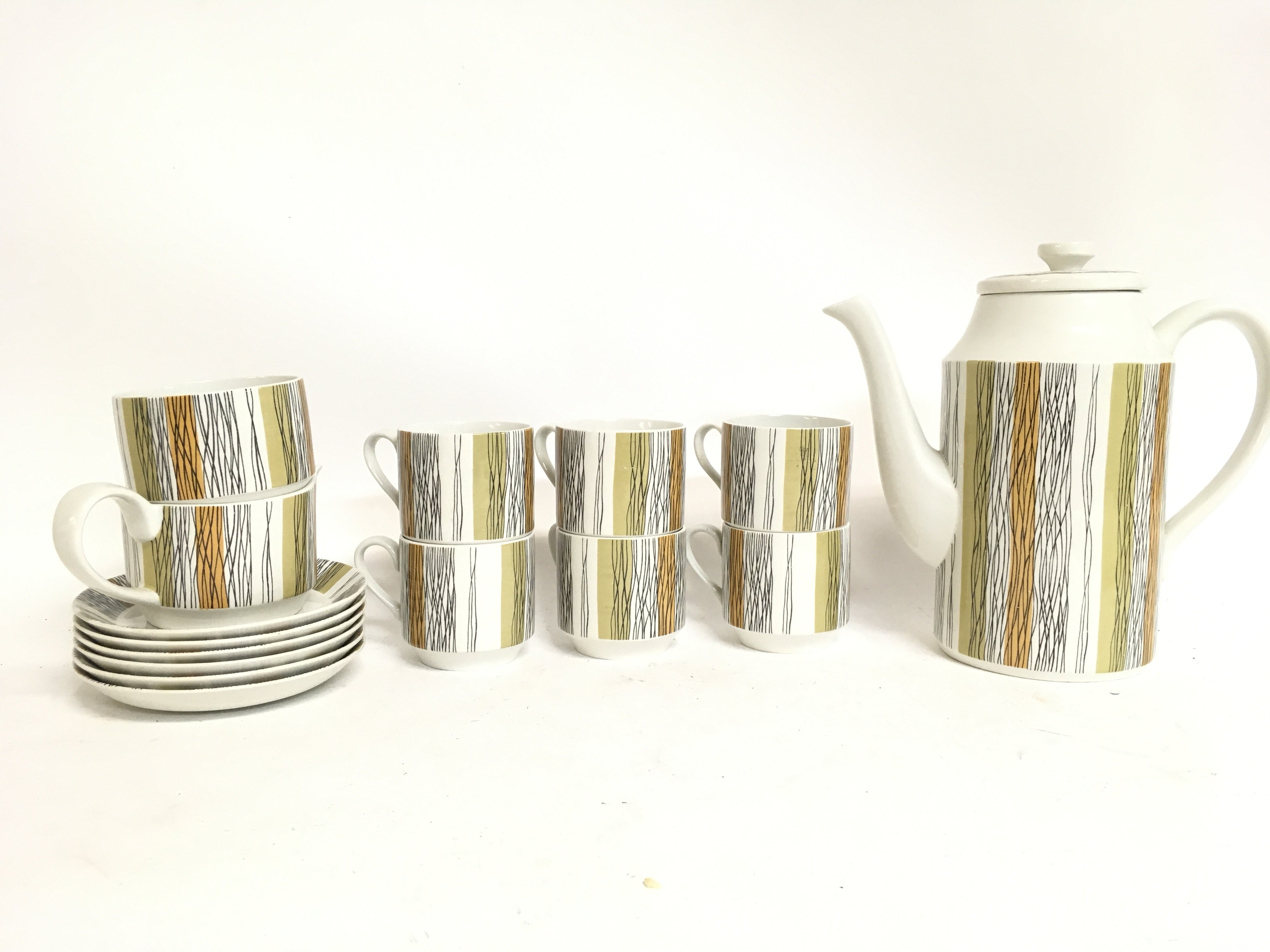 A Midwinter Sienna coffee set. This lot cannot be