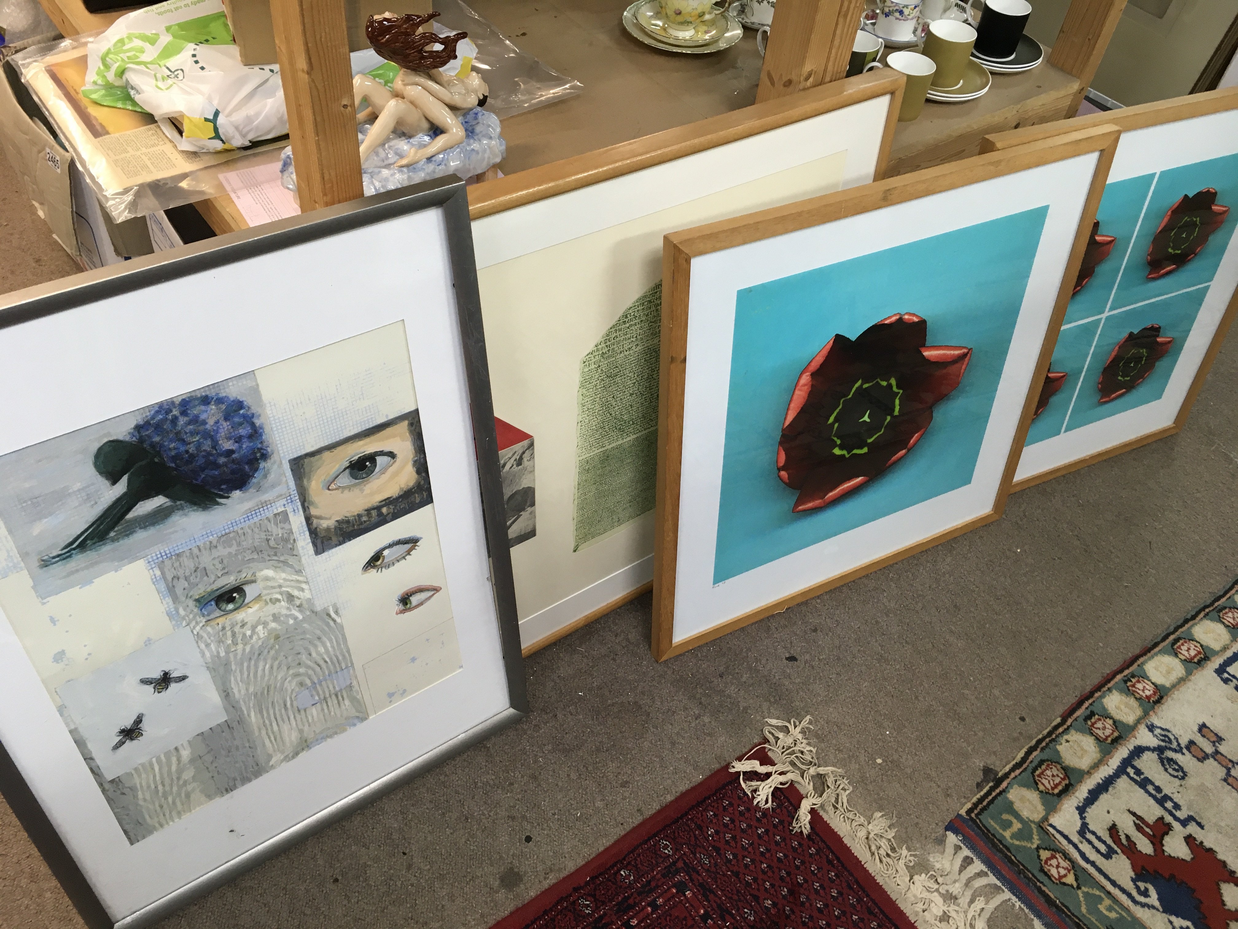 A collection of framed abstract prints including A