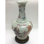 A famille rose vase with hand painted decoration o