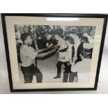 A framed, glazed and signed print of Muhammad Ali