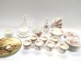 A collection of assorted Coalport items including a Cairo red part tea set.