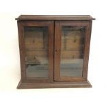 An oak spice cabinet. Dimensions 22.5x35x35cm lot