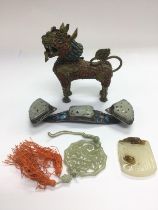 A small collection of jade and enamel items. Shipp