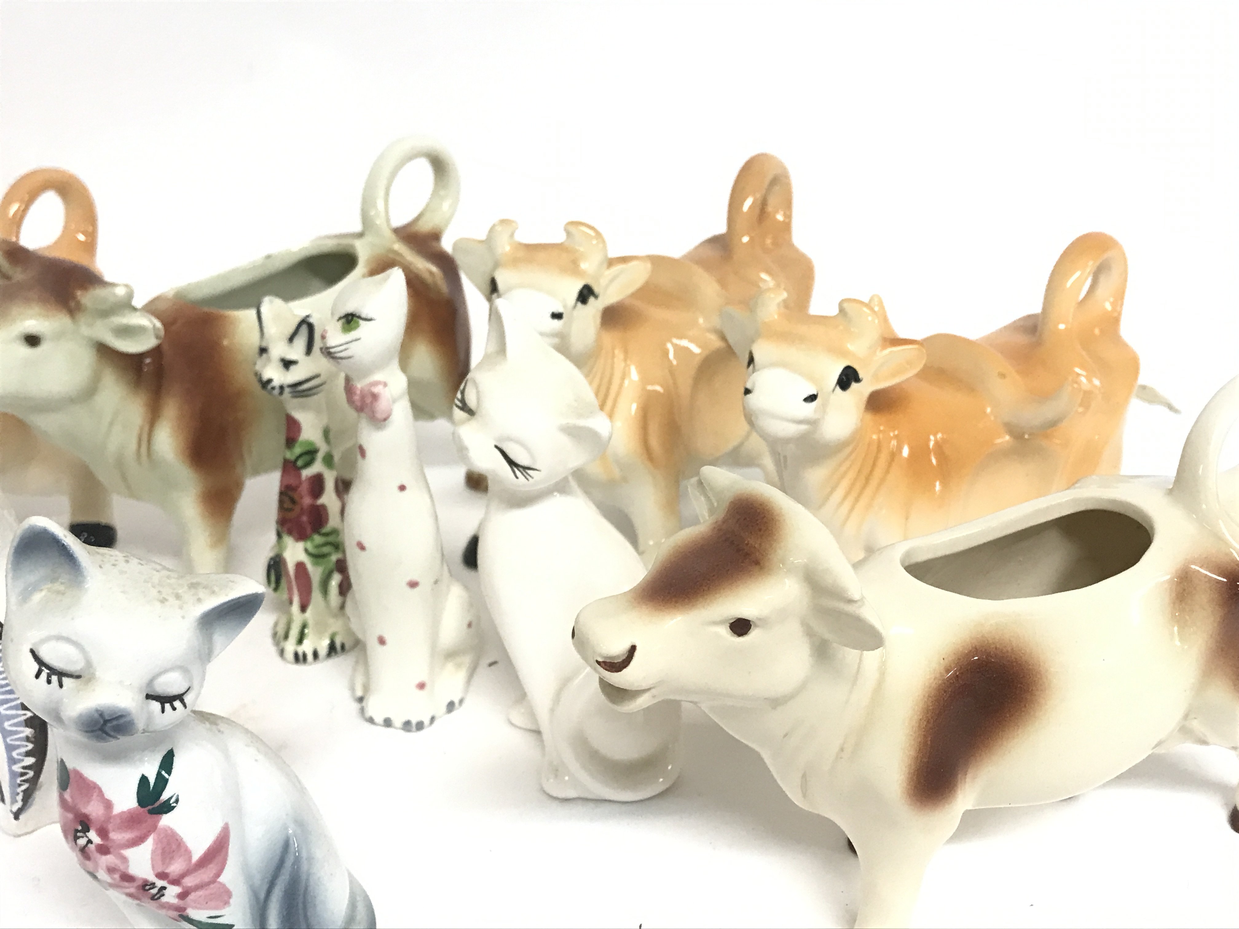 A large Collection of various Jersey pottery cows, - Image 3 of 3