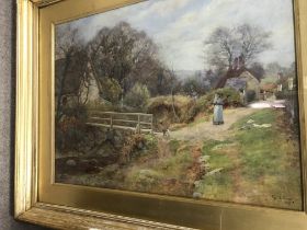 A framed watercolour country side view wit stream