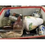 Four boxes containing antique glass bottles 18th c