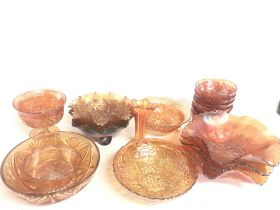 A collection of carnival glass bowls , this lot ca