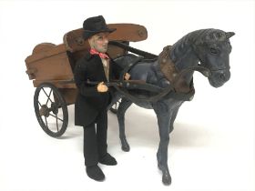 A vintage wooden cart with horse and figure, 31cm