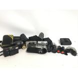 A Collection of various binoculars and digital cam